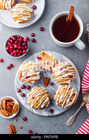 Muffins, cakes with cranberry and pecan nuts. Christmas decoration. Top view Stock Photo