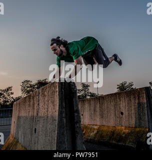 Bergamo Italy October 12th 2018:Parkour 'physical activity in running, climbing and jumping to overcome an obstacle