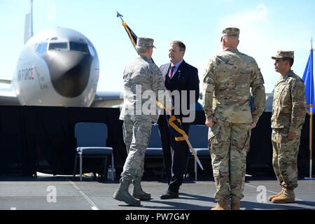 Maj. Gen. William N. Reddel passes the colors to Gov. Christopher T. Sununu during change of command ceremony at Pease Air National Guard Base, Sept. 23, 2017. Brig. Gen. David Mikolaities assumes duties as the Adjutant General, New Hampshire National Guard from Maj. Gen. William Reddel. (N.H. National Guard Stock Photo