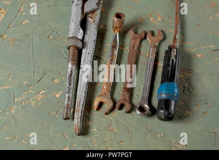 Set of rusty old wrenches arranged in a row, studio closeup Stock Photo