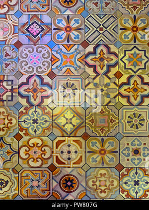 Multicolored patterned tile floor in restaurant, Spain Stock Photo