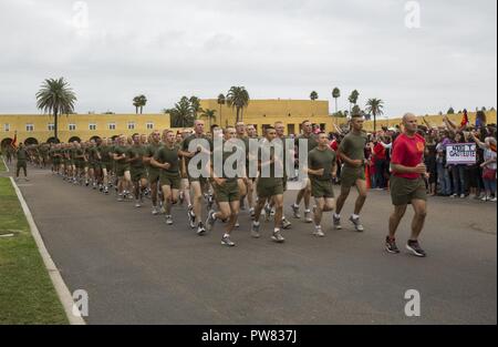 The new Marines of Bravo Company, 1st Recruit Training Battalion, reunite with their loved ones during family day at Marine Corps Recruit Depot San Diego, today.  After nearly thirteen weeks of training, the Marines of Bravo Company will officially graduate from recruit training tomorrow. Stock Photo