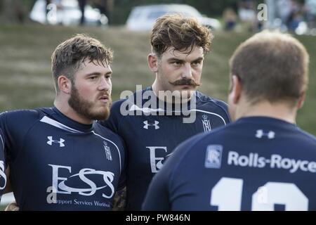 Royal Sailors assigned to the Royal Navy Rugby Team stand by before the start of an exhibition game between the All Marine Rugby Team and Royal Navy Rugby Team at Butler Stadium on Marine Corps Base Quantico, Va., Sept. 20, 2017. The match was a part of the Royal Navy Rugby Union Senior XV Tour, which consisted of matches against the United States Naval Academy and the Potomac Rugby Club. Stock Photo