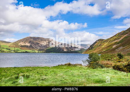 View on  scenic mountain valley with cloudy blue sky above.Idyllic landscape of rural Cumbria in North West England.Nature Uk.Lake district scenery. Stock Photo