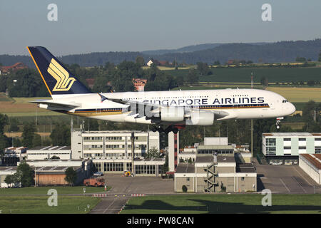 Singapore Airlines Airbus A380 with registration 9V-SKF on short final for runway 34 of Zurich Airport. Stock Photo