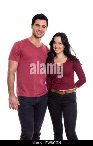 Studio shot of young happy couple smiling and in love Stock Photo