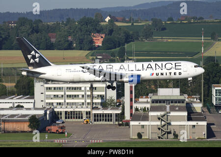 United Airlines Boeing 767-300 in Star Alliance livery with registration N653UA on short final for runway34 of Zurich Airport. Stock Photo