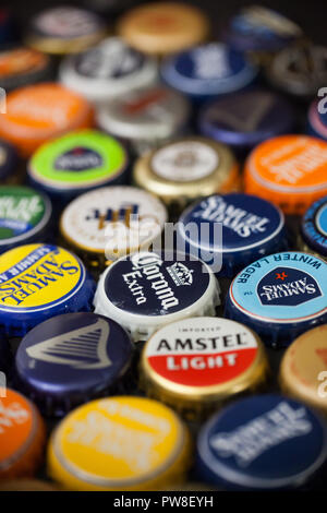 WOODBRIDGE, NEW JERSEY - October 13, 2018: A collection of colorful beer bottle caps of different brands is seen Stock Photo