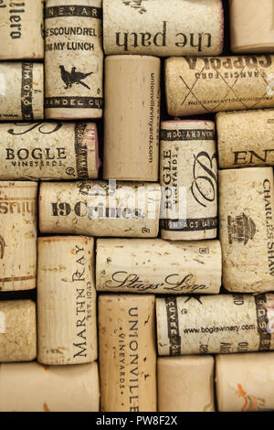 WOODBRIDGE, NEW JERSEY - October 13, 2018: A collection of wine corks from various vineyards is showne Stock Photo