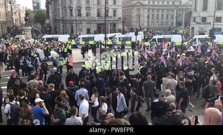 Still photo of a planned silent march by anti-Islam 'football lads' group passing through central London, which turned violent after supporters pushed through police escorts and got in fights with officers. Stock Photo