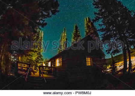 At Night View Of One Of The Cabins At Trappers Lake Lodge With A