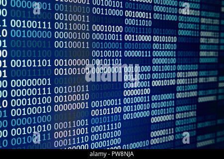 Big overload blockchain data. Blue binary data code background for internet and cyberspace security function. one and zero text on LED moniter screen. Stock Photo