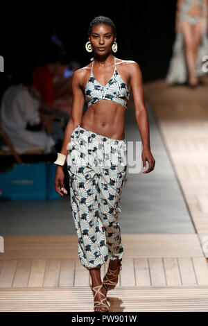 Lisbon, Portugal. 13th Oct, 2018. A model presents a creation from the Cia Maritima Spring/Summer 2019 collection during the 3rd day of the Lisboa Fashion Week - Moda Lisboa, at the Pavilhao Carlos Lopes in Lisbon, Portugal, on October 13, 2018. Credit: Pedro Fiuza/ZUMA Wire/Alamy Live News Stock Photo