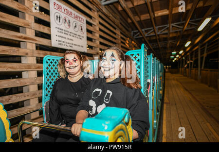 Margate, UK. 13th October 2018. Halloween shocks and scares with actors in costumes at the launch of Screamland at Dreamland in Margate. Credit: Thomas Faull/Alamy Live News Stock Photo