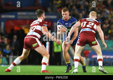 Manchester, UK. 13th October 2018 , Old Trafford,  Manchester, England;  Betfred Super League Grand Final, Wigan Warriors v Warrington Wolves; Jack Hughes of Warrington Wolves barges through   Credit: Richard Long/News Images Credit: News Images /Alamy Live News Stock Photo