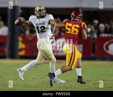 Colorado quarterback Steven Montez (12) looks downfield in the first