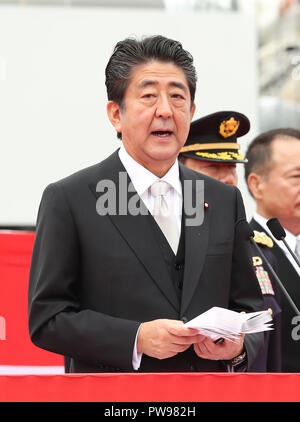 Asaka, Japan. 14th Oct, 2018. Japanese Prime Minister Shinzo Abe delivers a speech during the annual military review at the Ground Self Defence Force's Asaka training ground, suburban Tokyo on Sunday, October 14, 2018. 4,000 military personels, 260 military vehicles and 40 aircrafts participated the parade. Credit: Yoshio Tsunoda/AFLO/Alamy Live News Stock Photo