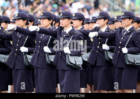 Asaka, Japan. 14th Oct, 2018. Japanese Ground Self Defense Force's female troops march during the annual military review at the Ground Self Defence Force's Asaka training ground, suburban Tokyo on Sunday, October 14, 2018. 4,000 military personels, 260 military vehicles and 40 aircrafts participated the parade. Credit: Yoshio Tsunoda/AFLO/Alamy Live News Stock Photo