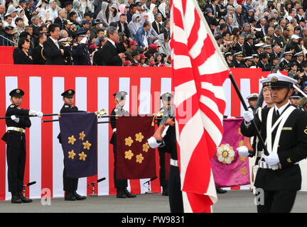 Asaka, Japan. 14th Oct, 2018. Japanese Prime Minister Shinzo Abe (L) inspects troops during the annual military review at the Ground Self Defence Force's Asaka training ground, suburban Tokyo on Sunday, October 14, 2018. 4,000 military personels, 260 military vehicles and 40 aircrafts participated the parade. Credit: Yoshio Tsunoda/AFLO/Alamy Live News Stock Photo