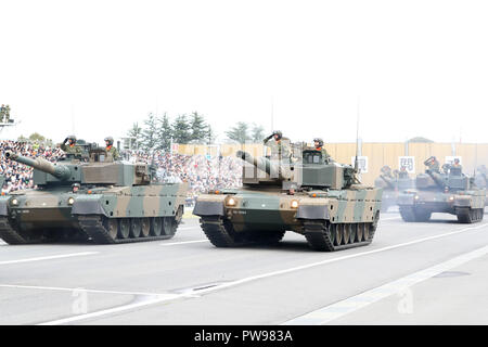 Asaka, Japan. 14th Oct, 2018. Tank troops take part in the annual military review at the Ground Self Defence Force's Asaka training ground, suburban Tokyo on Sunday, October 14, 2018. 4,000 military personels, 260 military vehicles and 40 aircrafts participated the parade. Credit: Yoshio Tsunoda/AFLO/Alamy Live News Stock Photo