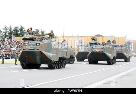 Asaka, Japan. 14th Oct, 2018. Japanese amphibian military vehicles take part in during the annual military review at the Ground Self Defence Force's Asaka training ground, suburban Tokyo on Sunday, October 14, 2018. 4,000 military personels, 260 military vehicles and 40 aircrafts participated the parade. Credit: Yoshio Tsunoda/AFLO/Alamy Live News Stock Photo