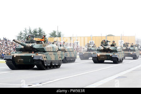 Asaka, Japan. 14th Oct, 2018. Tank troops take part in the annual military review at the Ground Self Defence Force's Asaka training ground, suburban Tokyo on Sunday, October 14, 2018. 4,000 military personels, 260 military vehicles and 40 aircrafts participated the parade. Credit: Yoshio Tsunoda/AFLO/Alamy Live News Stock Photo