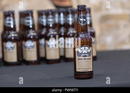 London, UK. 14 October 2018.  A 'Doggy Style' event where the latest fashion, hip and trendy brands of dog accessories 'Bottom' beer for dogs Credit Ian Davidson/Alamy Live News Stock Photo