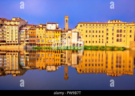 Arno river waterfront morning reflections in Florence, Tuscany region of Italy