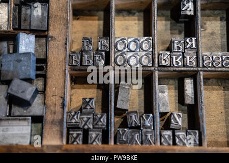 Wooden drawer of metal type blocks for printing Stock Photo