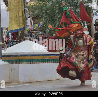 A masked monk performs at a traditional cham Tibetan Buddhist dance, Leh, Ladakh, India Stock Photo