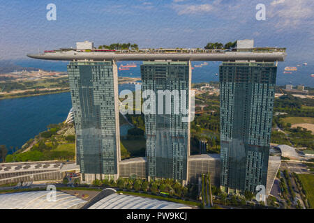 Picture effect of Marina Bay Sands hotel skyscraper architecture from aerial point of view, a famous skyline view. Singapore. Stock Photo