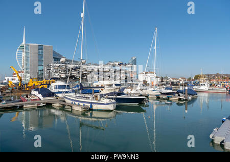 Liesure boats alongside The Camber area on Portsmouth Harbour, England, UK Spinnacker tower background. Stock Photo