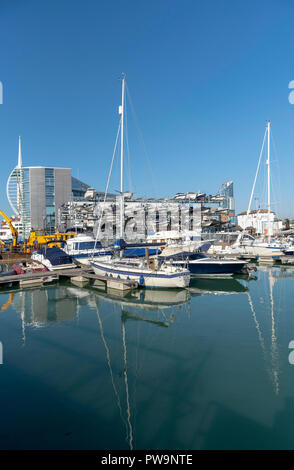 Liesure boats alongside The Camber area on Portsmouth Harbour, England, UK Spinnacker tower background. Stock Photo