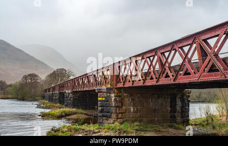 Railway bridge near Kilchurn Castle ruin along Loch Awe, Argyll and Bute, Scotland, UK Stock Photo