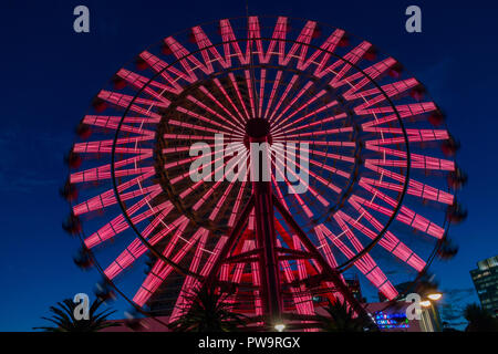 Night view of ferris wheel at Kobe Harborland, a shopping and entertainment area at Kobe Port, Japan. Stock Photo