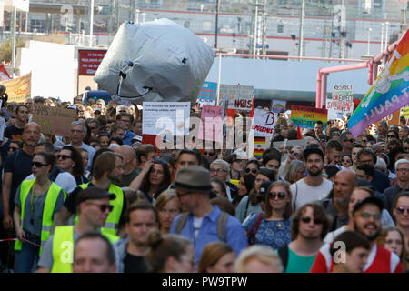 Frankfurt, Germany. 13th Oct, 2018. Protesters march with posters through Frankfurt. Over 3,500 people marched through Frankfurt, to protest against racism and for tolerance. They where accompanied by many local bands, performing on the way and at the rallies. The protest was part of several other protests against racism in Germany on the same day. Credit: Michael Debets/Pacific Press/Alamy Live News Stock Photo