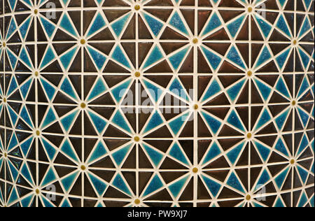 Brown and Blue Colored Geometric Arabian Traditional Pattern Mosaic Tiled Curve Column Stock Photo