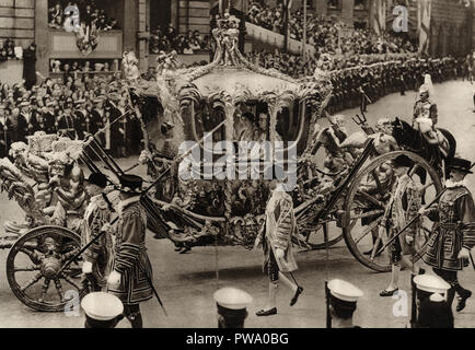 The coronation of George the sixth on May 12 1937 showing the king and queen in the Gold State Coach published in a souvenir book dated 1937 Stock Photo