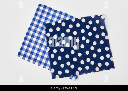 Two table napkins isolated on white background. Checkered and dotted cotton table napkins. Cloth table napkins. Stock Photo