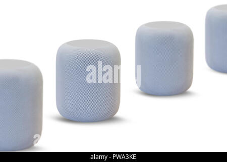Wireless speakers for listening to music in a row on a white background. Modern technologies. Stock Photo