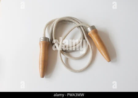 Vintage jump rope with wooden handles. Stock Photo