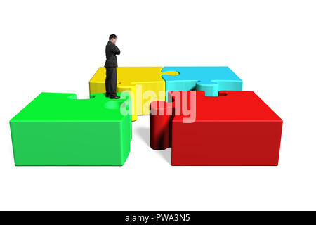 Standing on top of puzzles in white background Stock Photo