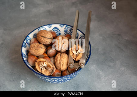 Different types of nuts in a bowl. Stock Photo