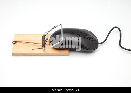 Back computer mouse and mousetrap isolated on white background. Stock Photo
