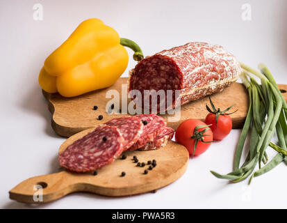 Sausage with pepper isolated on white background Stock Photo