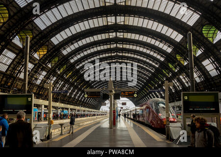 Milan Central Station - March 31: The platform of Milan central railway station on March 31, 2018 in Milan, Italy. The Milan railway station is the la Stock Photo