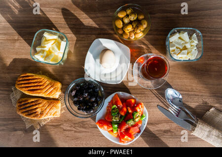 Breakfast with tea on wooden table Stock Photo