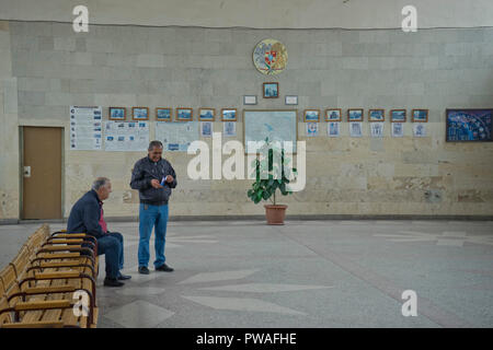 Passengers waiting at the bus station in Vanadzor, Armenia Stock Photo