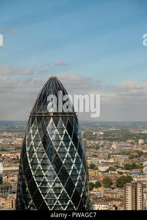 The Gherkin or 30 St Mary Axe is a commercial skyscraper in London's primary financial district, the City of London. It was completed in December 2003 Stock Photo