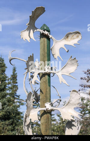 Native totem pole in the old city center of Skagway, Alaska - Painted ...